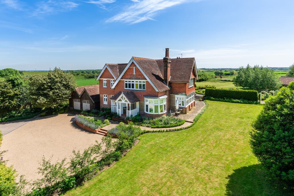 Traditional London family home exterior with brick façade and bay windows